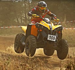 Motocross rider in mid-air to illustrate frequency and bouncing