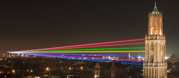 Red, green, and blue laser beams traveling in perfectly straight paths